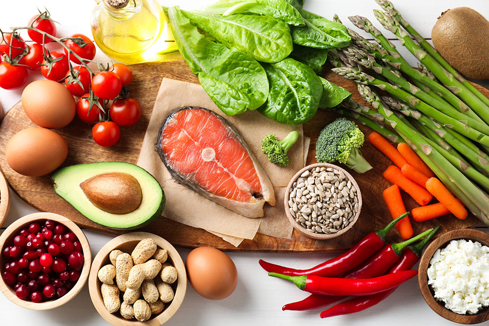 An image showing healthy foods on a white background