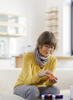 Woman taking medicine