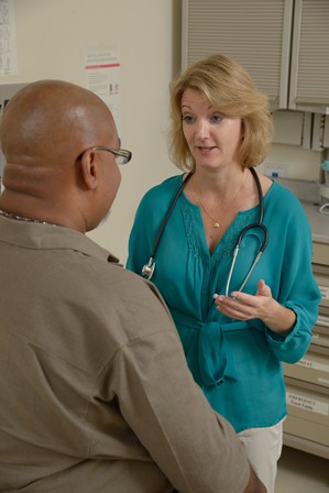Doctor talking to a patient.