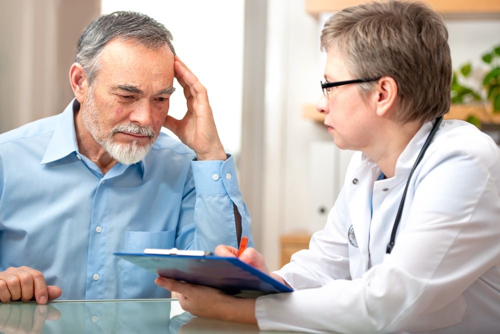 Doctor talking with a patient.